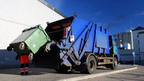 Blackwall recycling collection vehicle at a commercial site